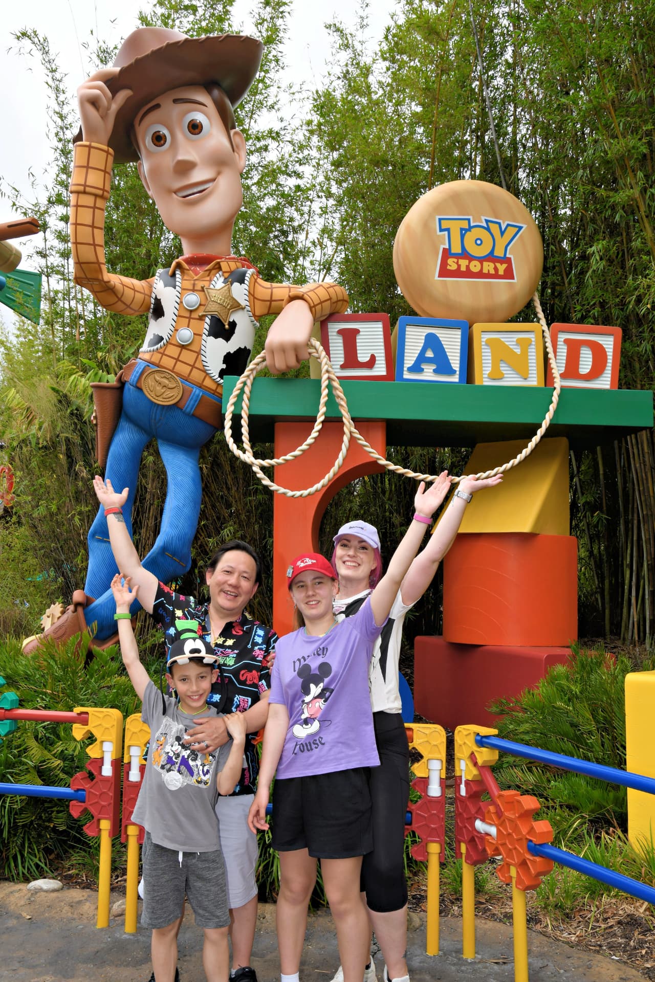 Jenn Lee with her family at Toy Story Land in Disney's Hollywood Studios