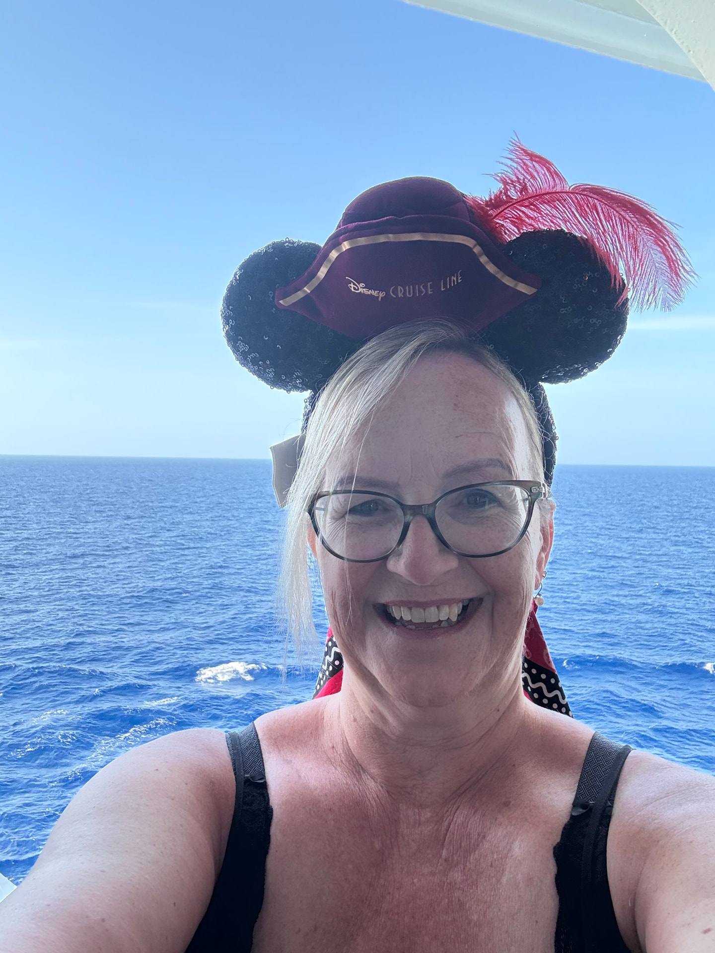 Teresa Mazzotta wearing Disney Cruise Line Mickey ears at sea