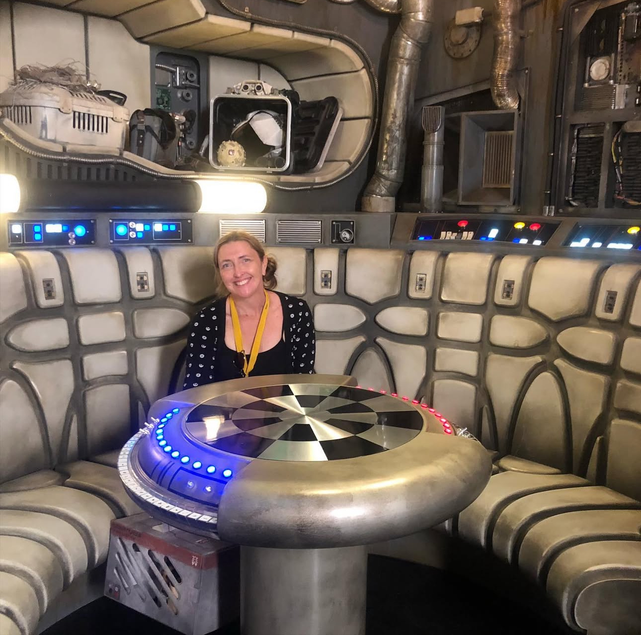 Lori inside the Millennium Falcon cockpit