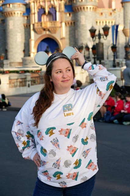 Laura on Main Street USA at Magic Kingdom wearing Mickey ears