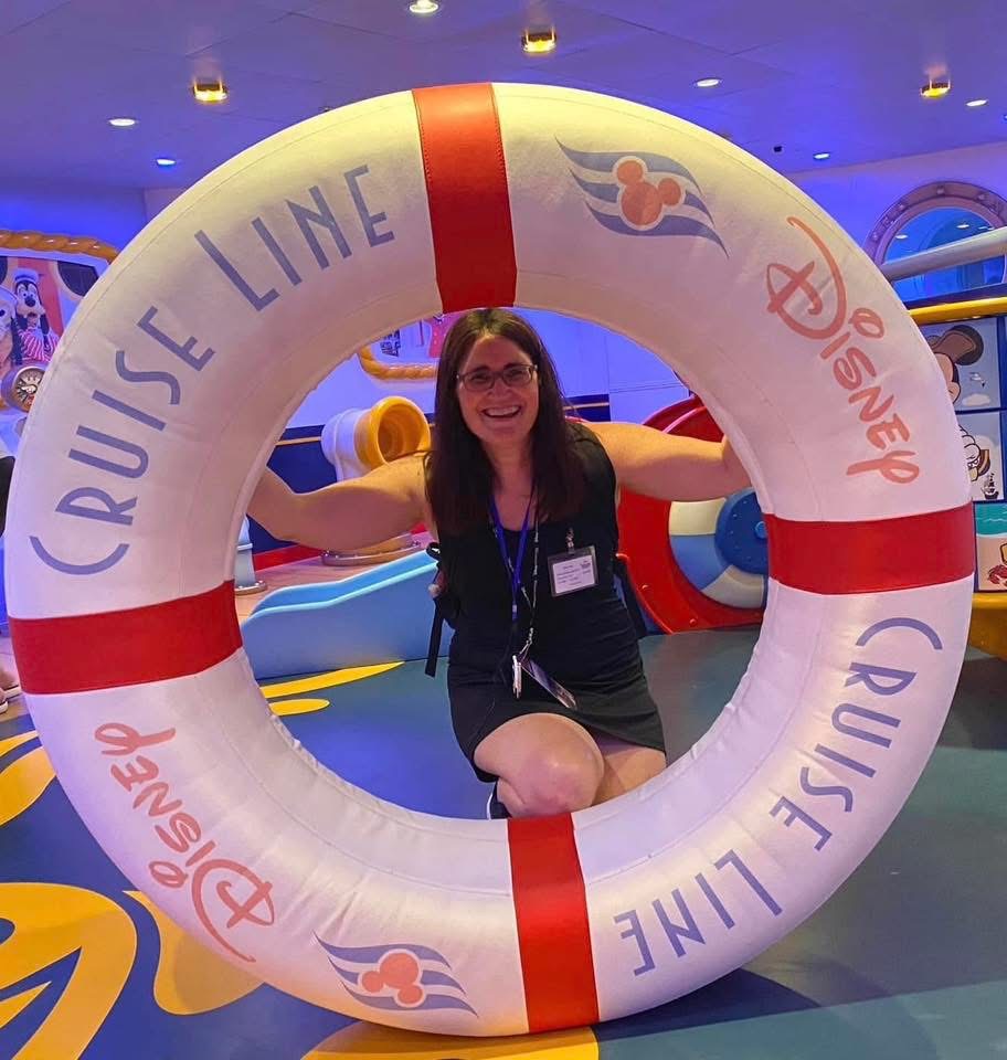 Amy Wear having fun in a Disney Cruise Line life ring