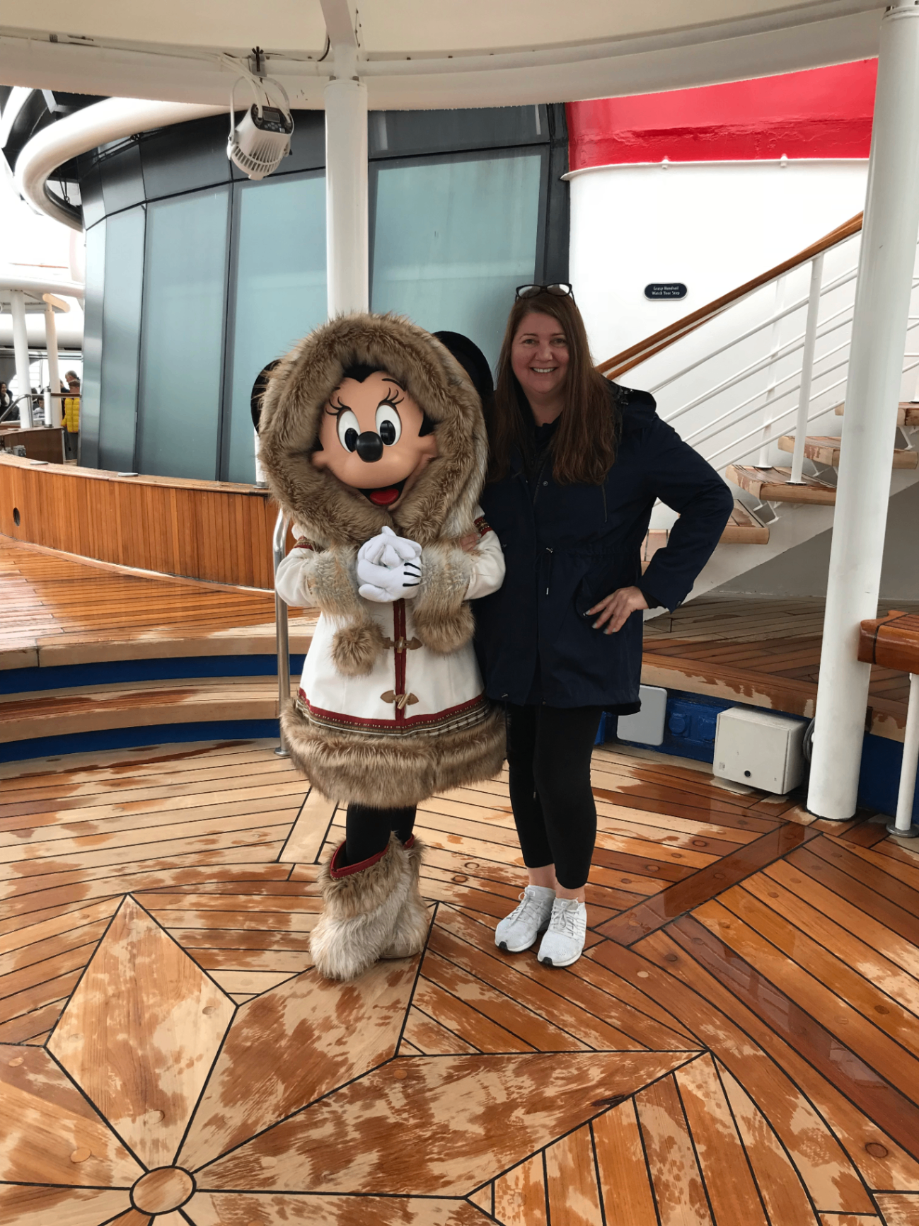 Sandra with Minnie Mouse on deck during a Disney Cruise from Vancouver