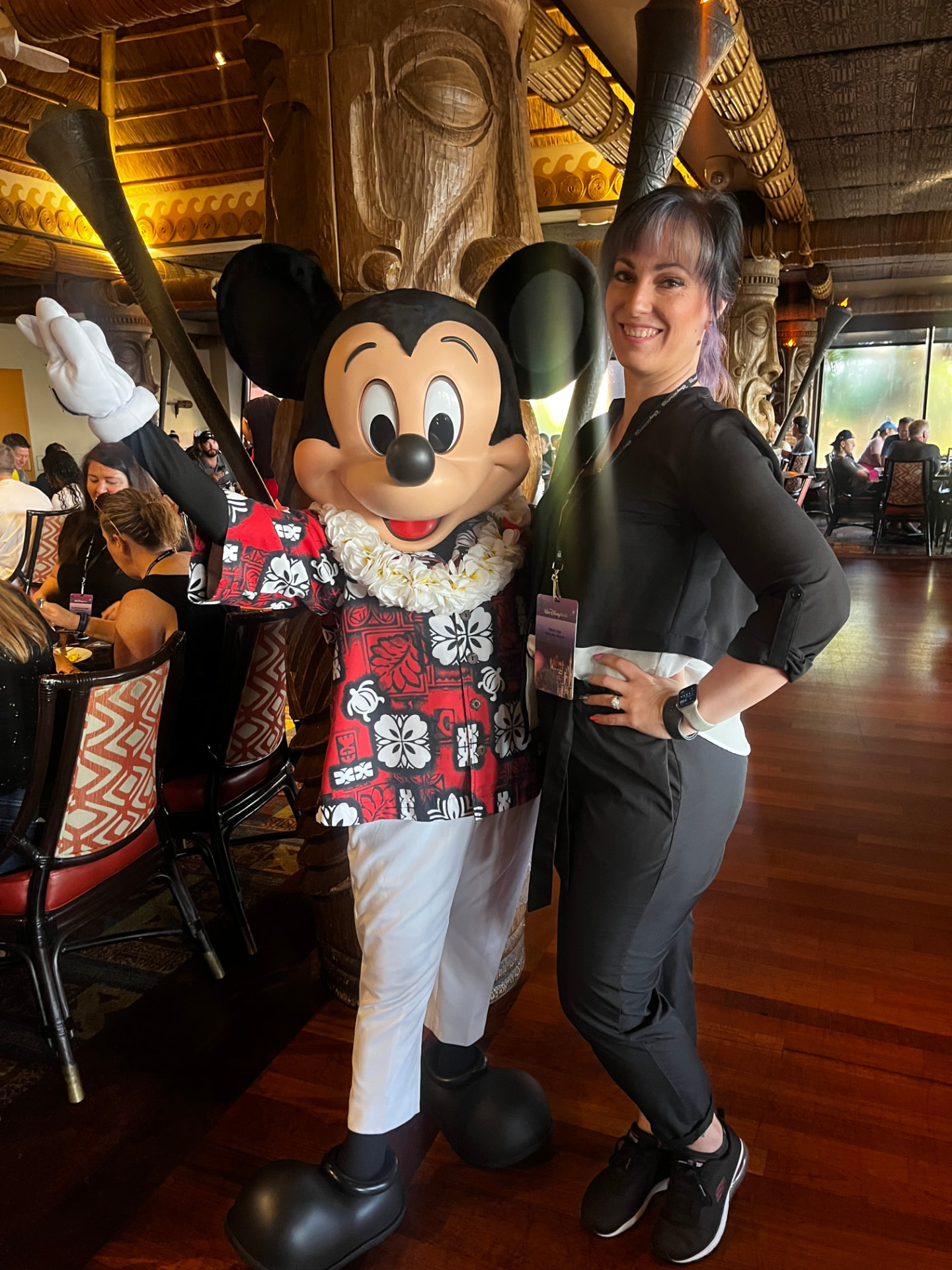 Jenn Lee with Mickey Mouse at Disney's Polynesian Village Resort