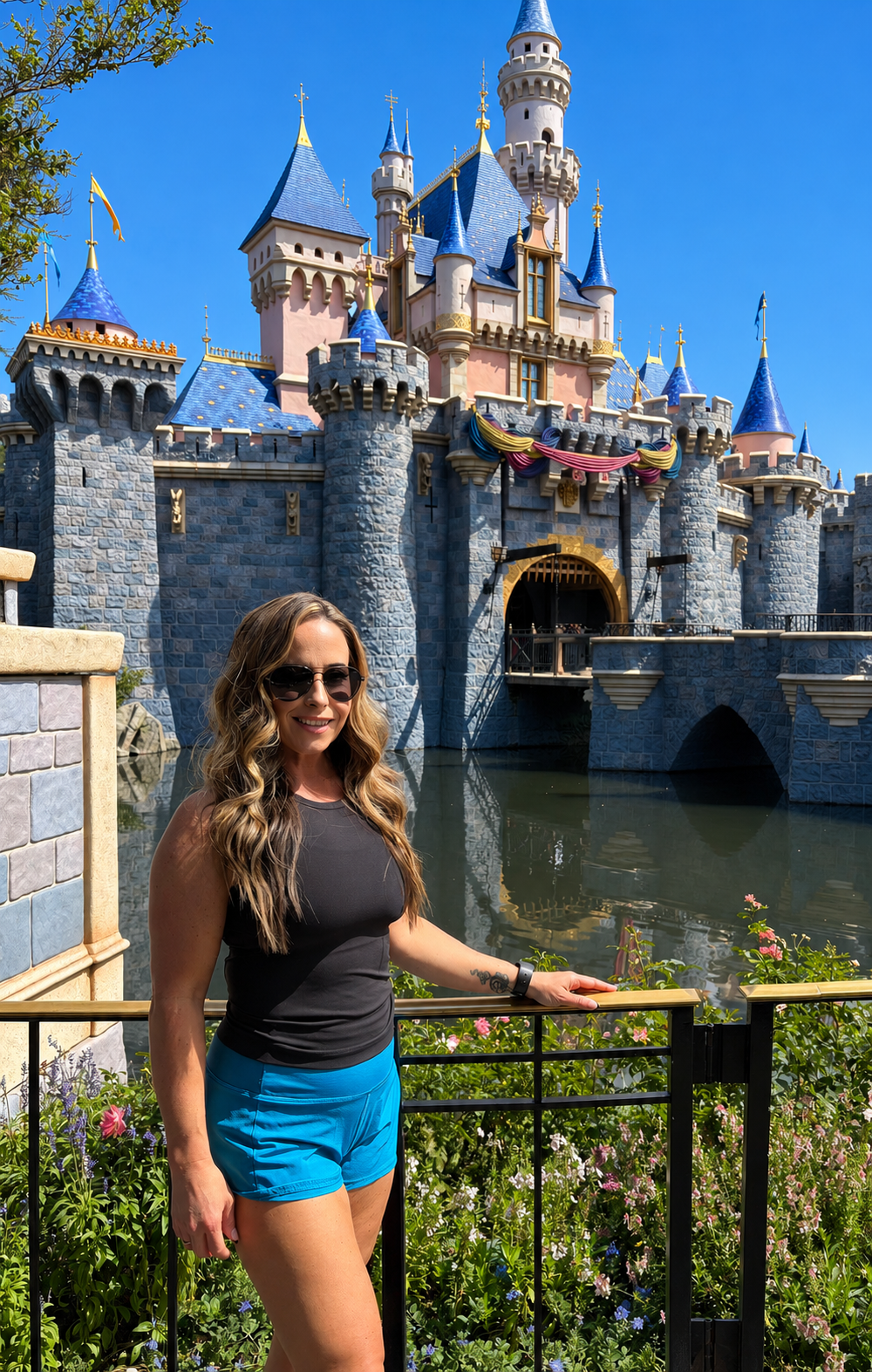 Melissa Rainville in front of Sleeping Beauty Castle at Disneyland