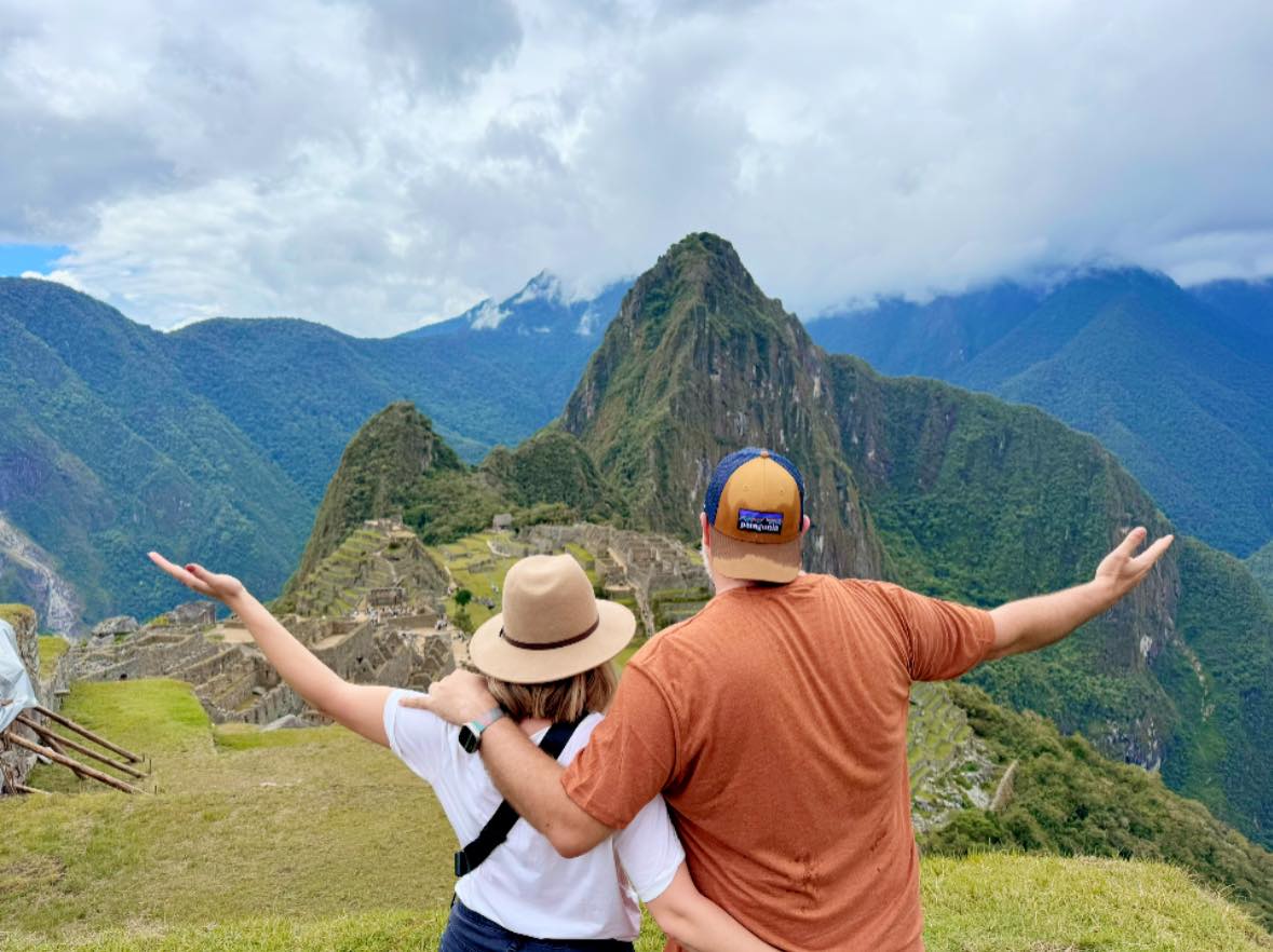 Michelle and her husband at Machu Picchu in Peru with Huayna Picchu in the background, on an Adventures by Disney trip