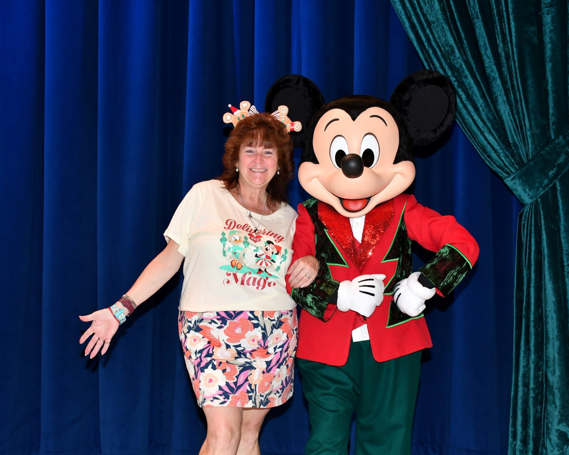 Faith Colletti with Mickey Mouse in his holiday outfit on a Disney cruise