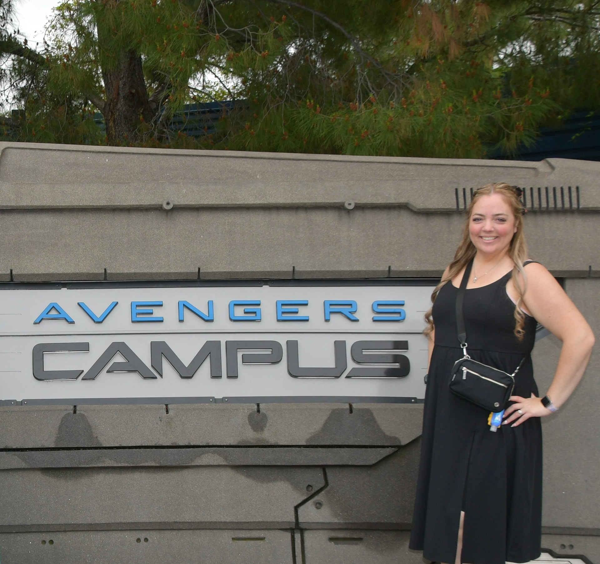 Sarah Field at the Avengers Campus entrance sign at Disney California Adventure