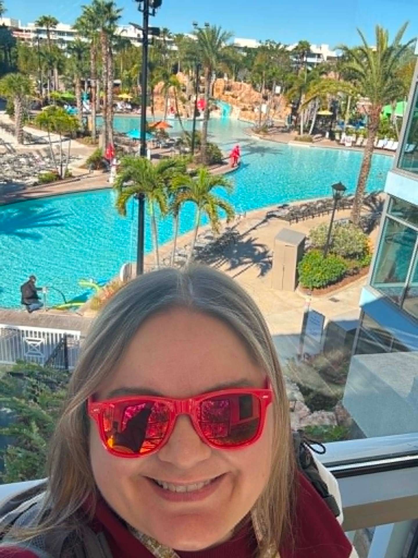 Diana at a Universal Orlando resort overlooking the pool