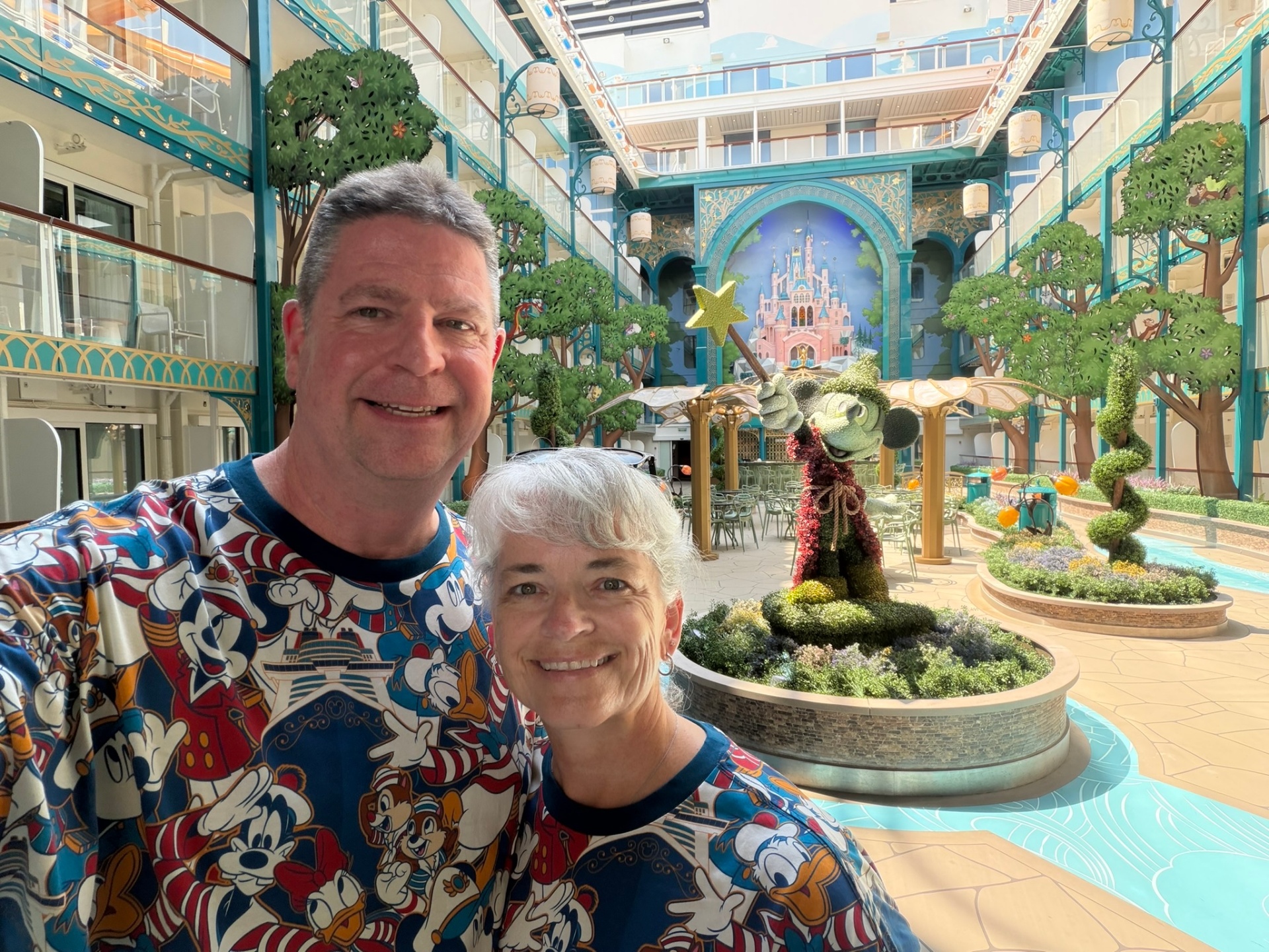 Jen & Steve Maude in the atrium of the Disney Adventure cruise ship