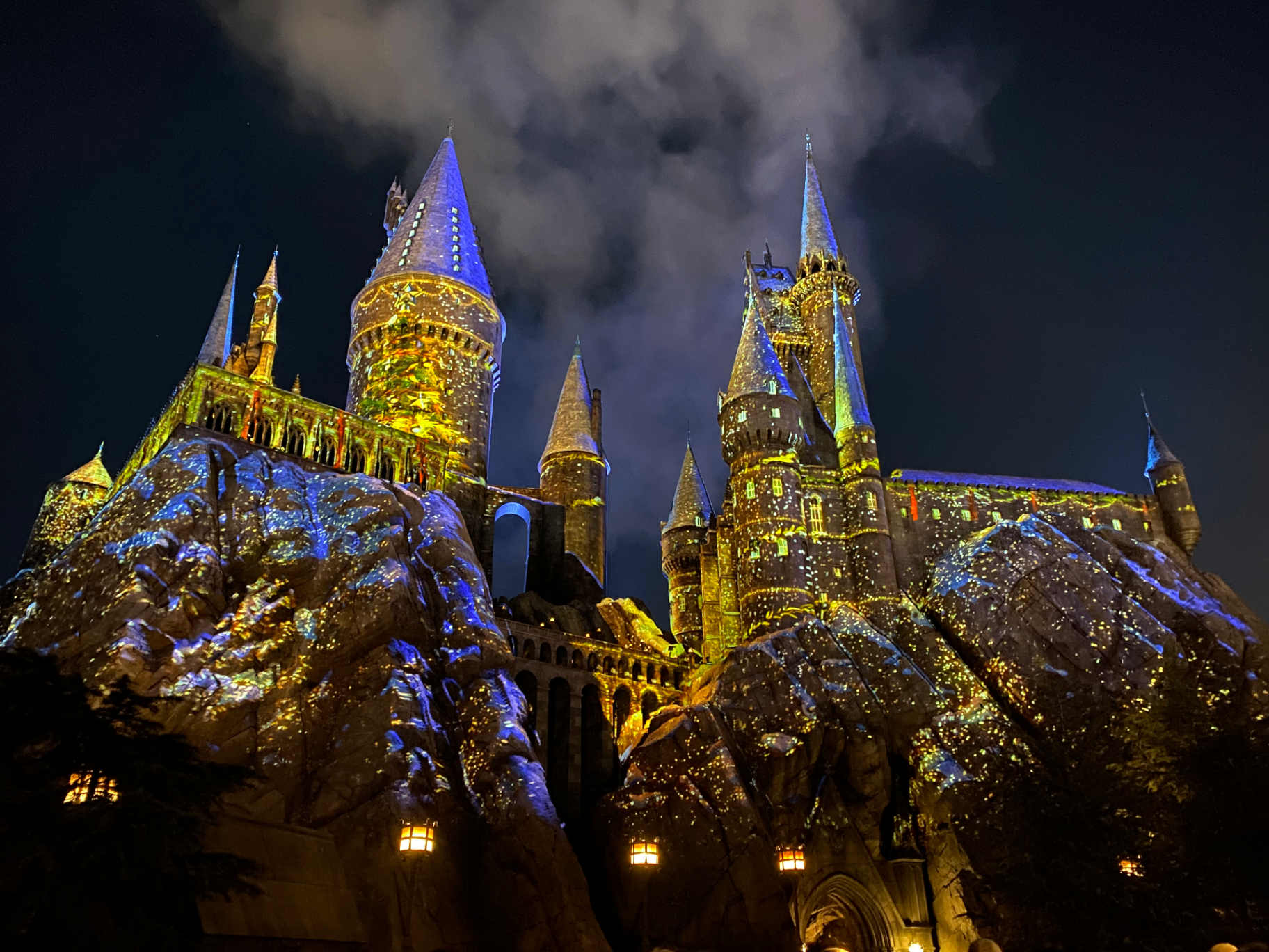 Hogwarts castle illuminated at night at Universal Orlando Resort