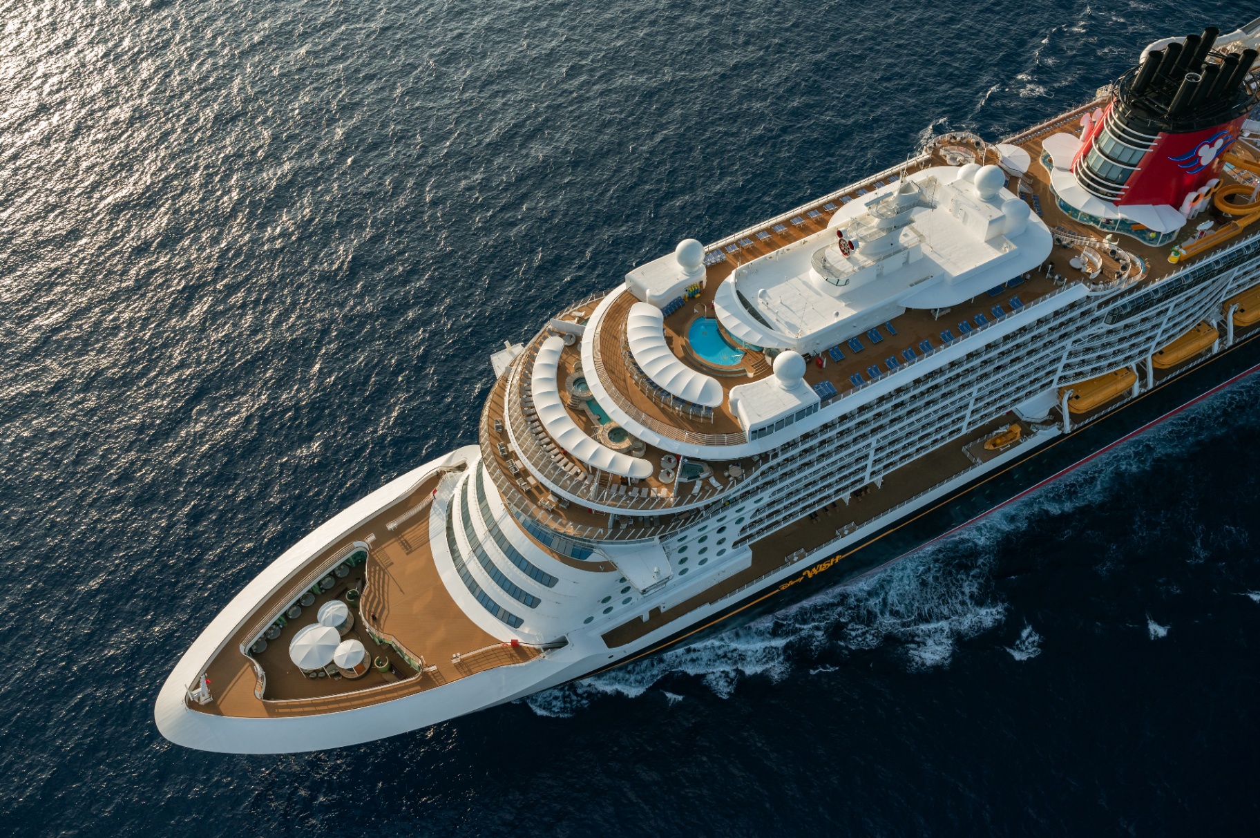 Disney Wish cruise ship aerial view sailing on open water